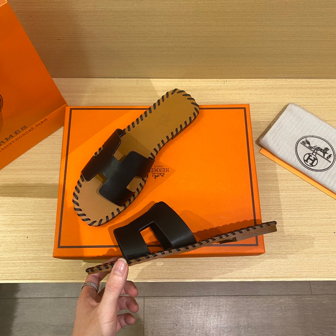 New H new woven slippers